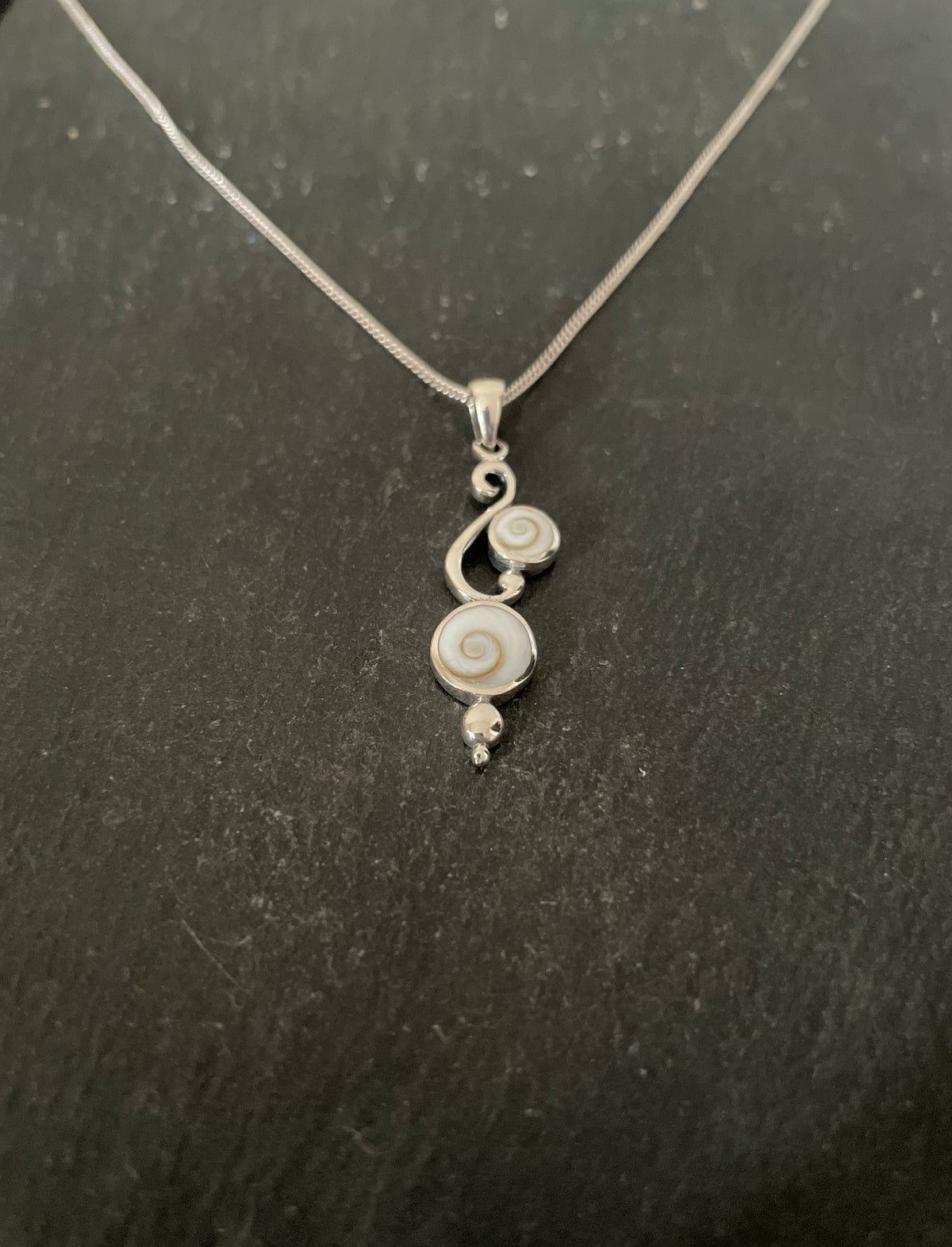 Shiva Shell and Silver Round Pendant