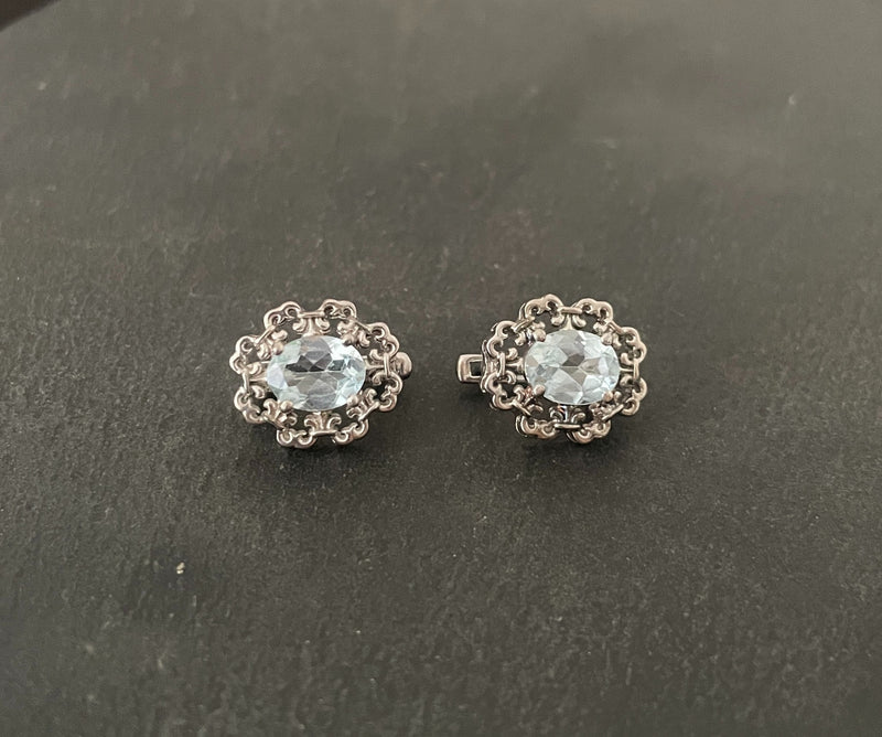 Blue Topaz and Silver Studs image 0