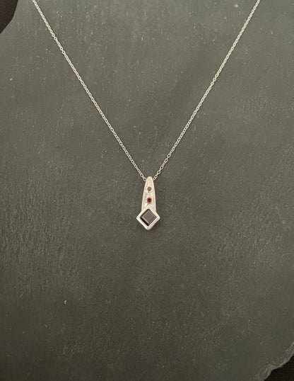 Three Stone Garnet Pendant image 0