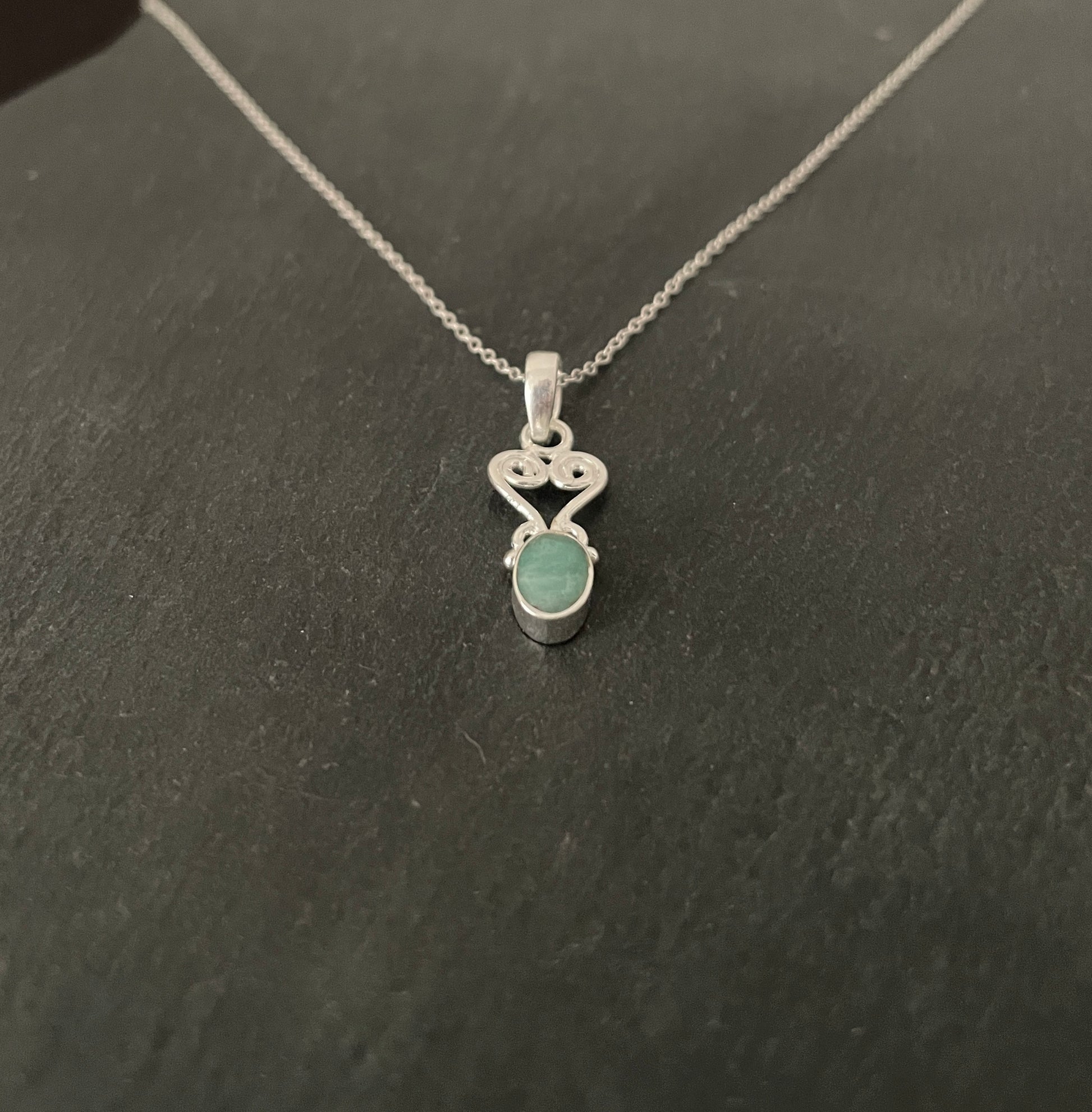 Oval Emerald and Silver Pendant image 1
