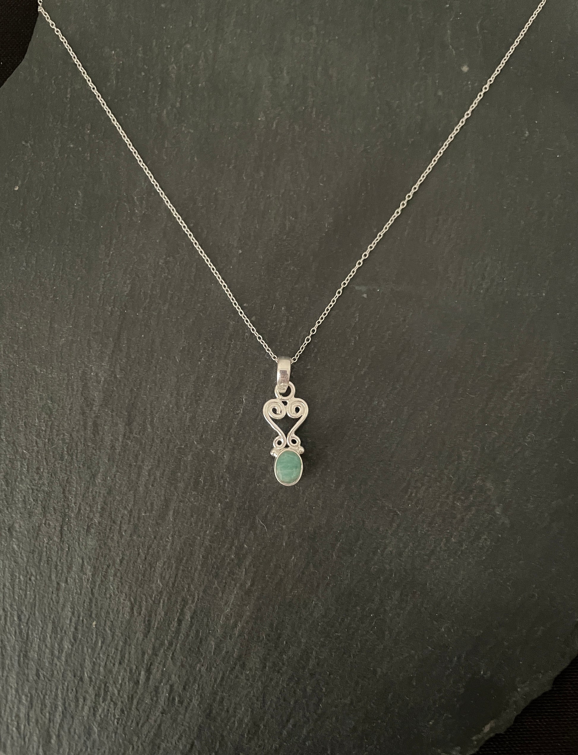Oval Emerald and Silver Pendant image 0