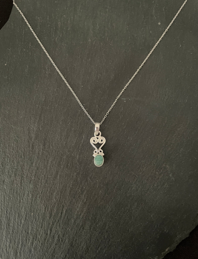 Oval Emerald and Silver Pendant image 0