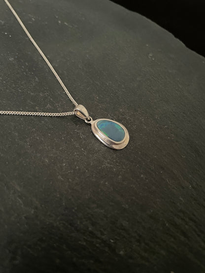 Fire Opal and Silver Pendant