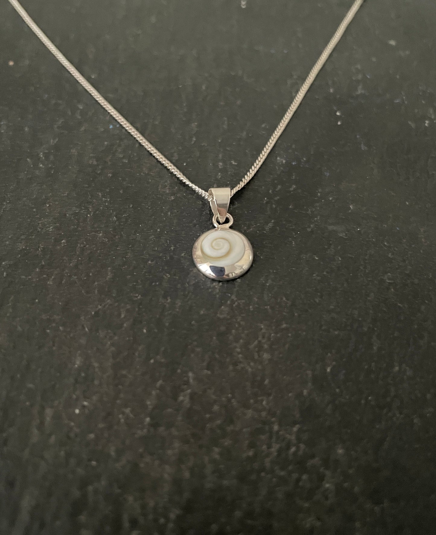 Shiva Shell and Silver Round Pendant