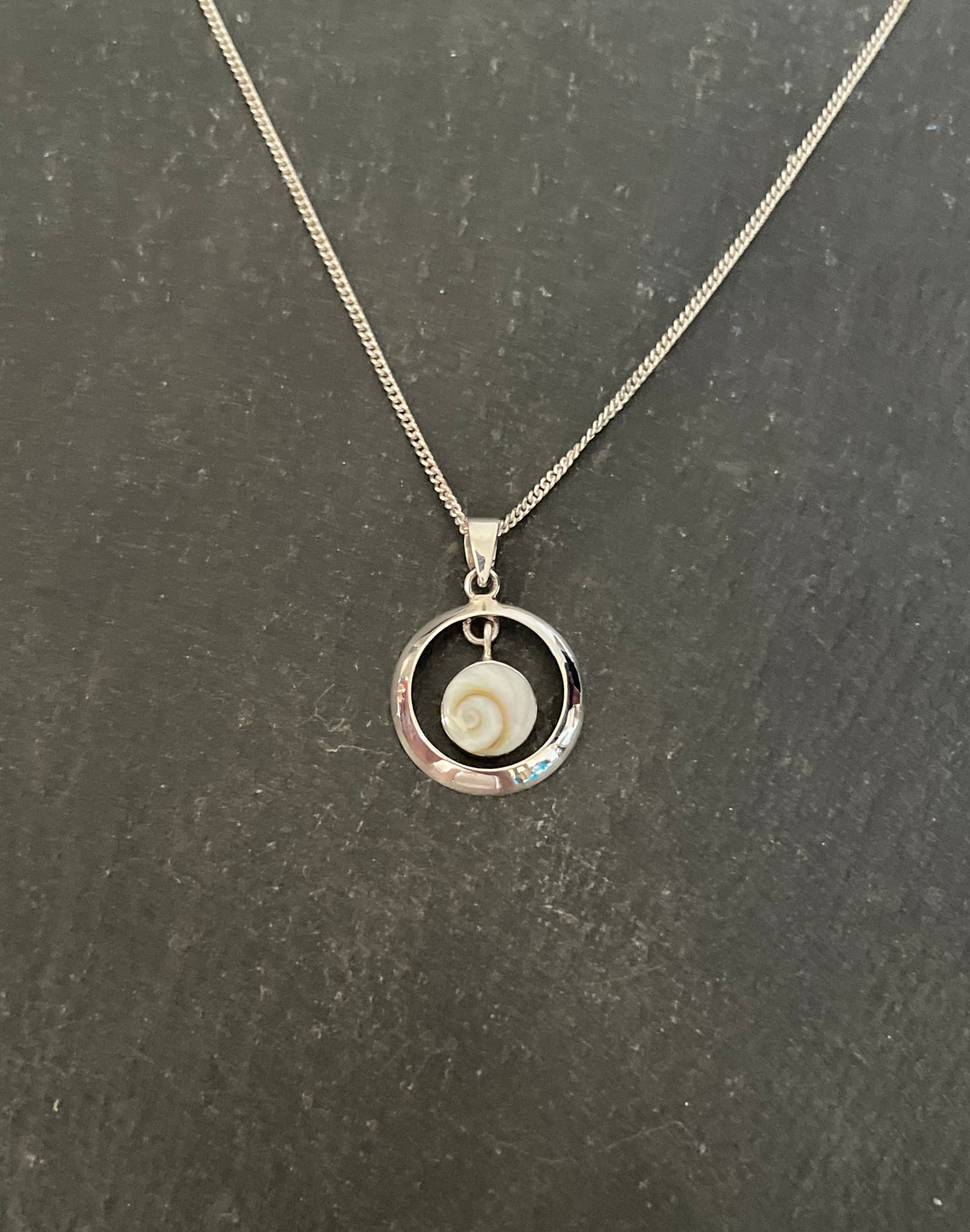 Shiva Shell and Silver Round Pendant
