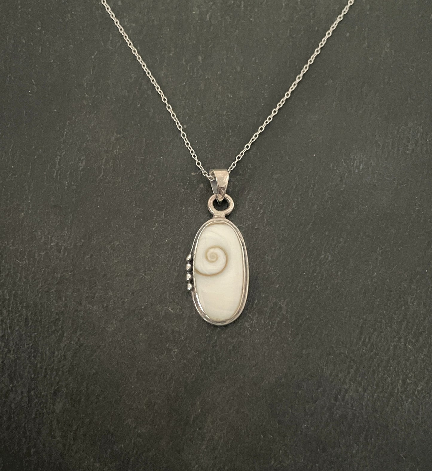 Shiva Shell and Silver Oval Pendant image 0