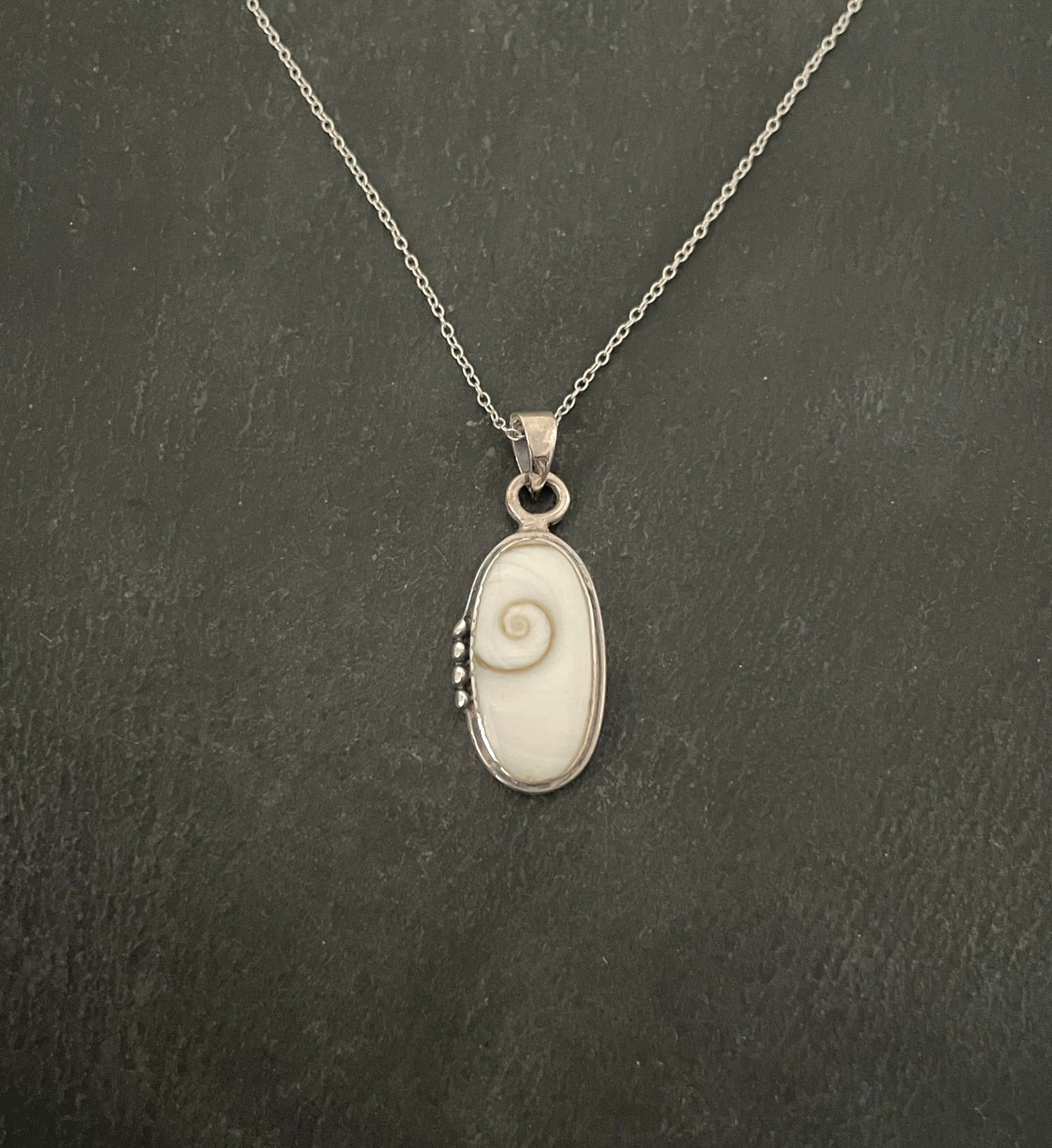 Shiva Shell and Silver Oval Pendant image 0