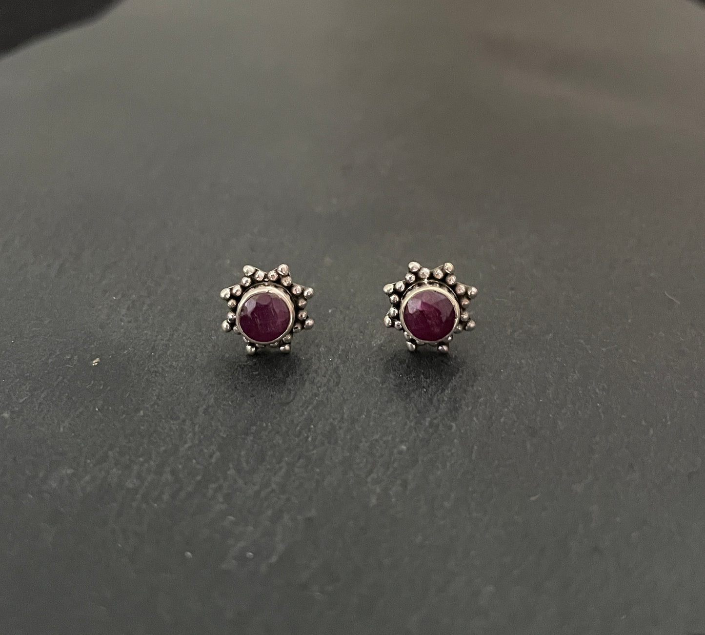 Round Ruby and Silver Studs image 0
