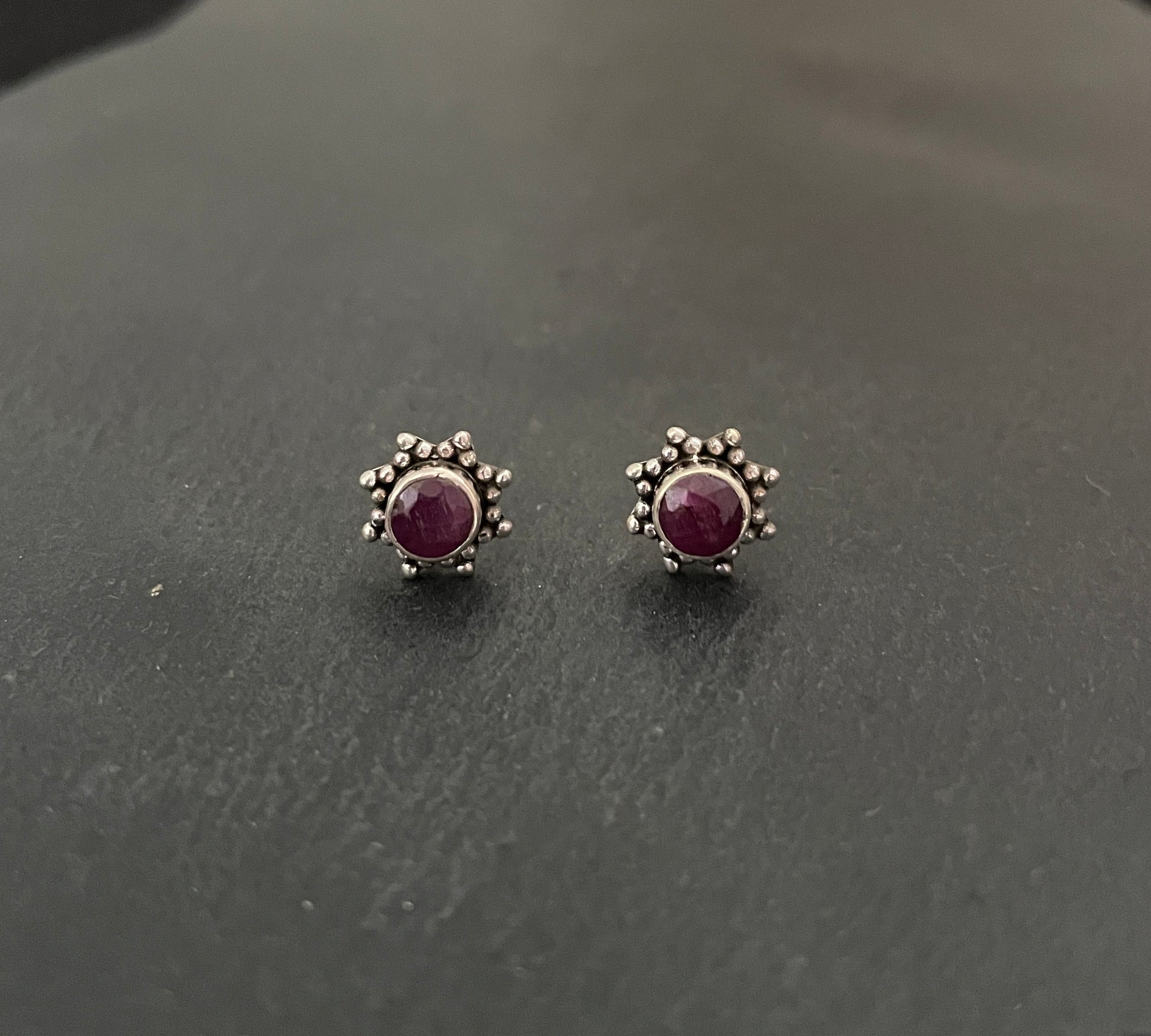 Round Ruby and Silver Studs image 0