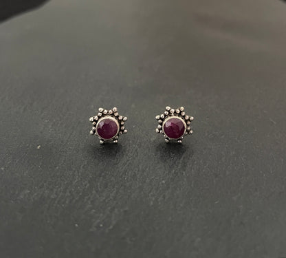 Round Ruby and Silver Studs image 0