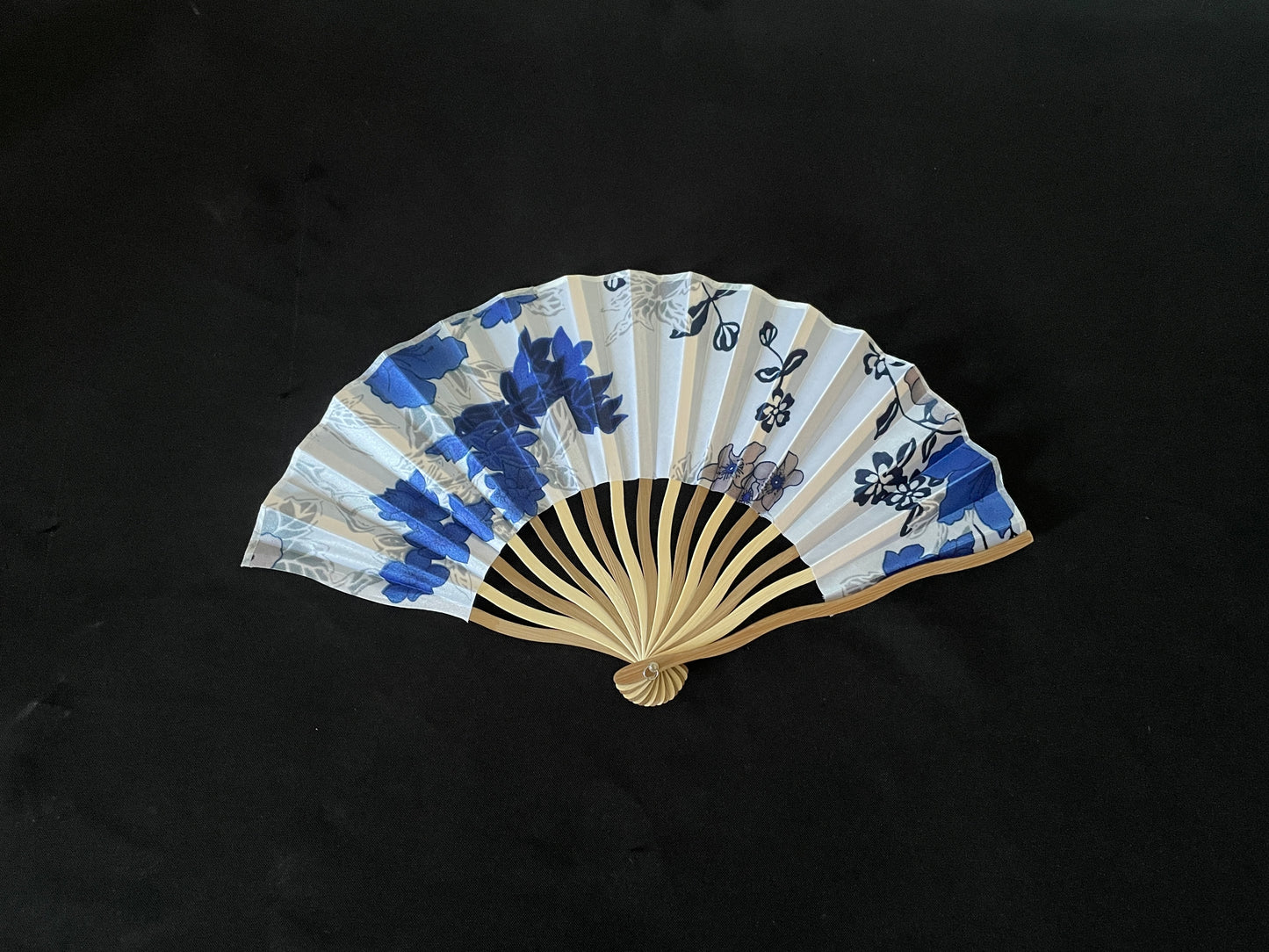 White and Blue Handheld Fan image 0