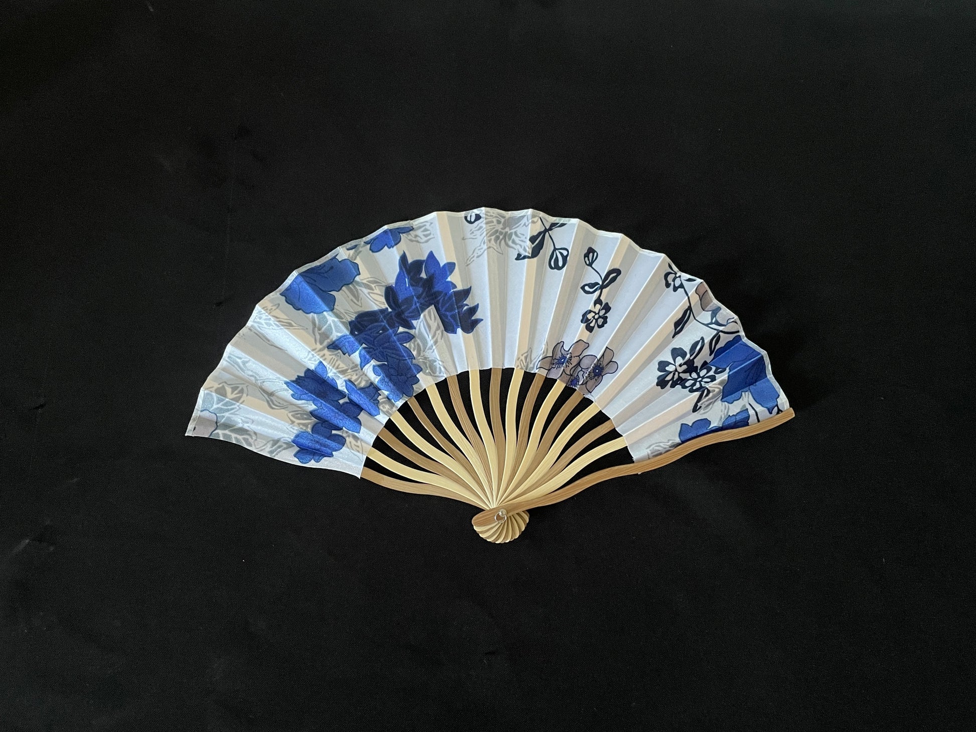 White and Blue Handheld Fan image 0
